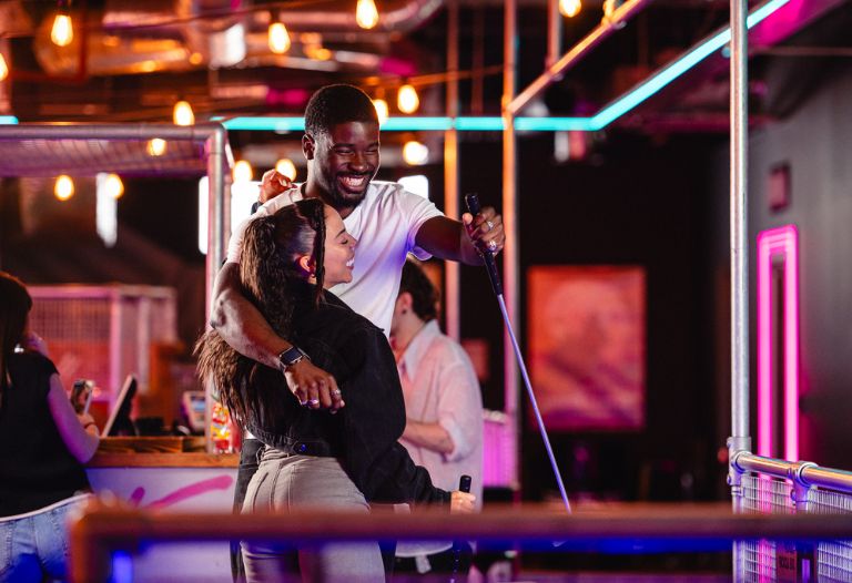 a couple playing crazy golf