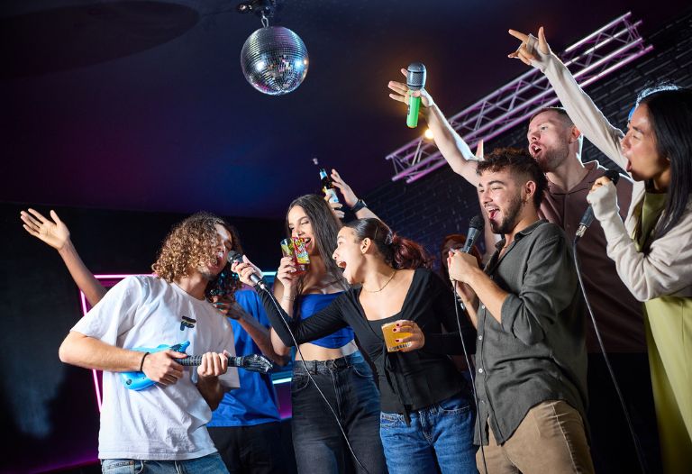 A group of friends celebrating and having fun in BOOM Battle Bar